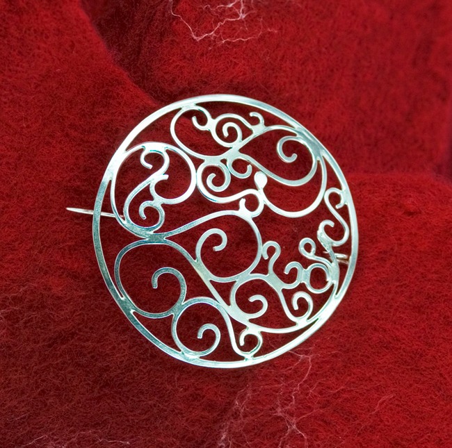 round filigree sterling silver brooch