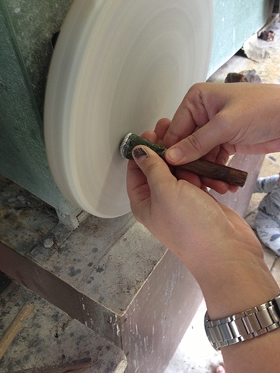 polishing on a leather wheel with tin oxide